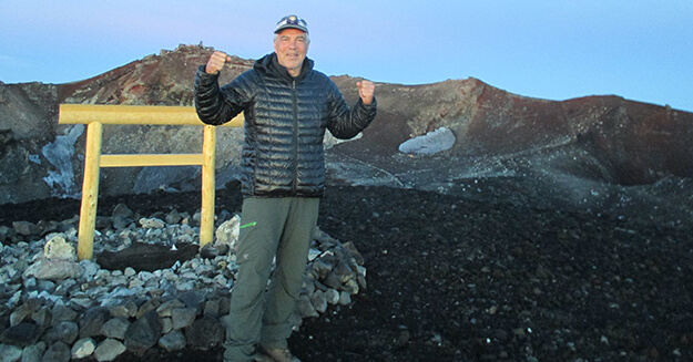 Jim Geiger at the summit of Mt. Fuji