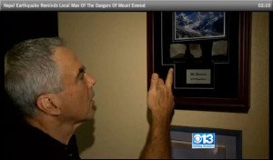 Jim Geiger showing CBS 13 the rocks he picked up on Mt. Everest last year