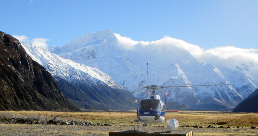Helicopter lands on the Tasman Glacier in New Zealand